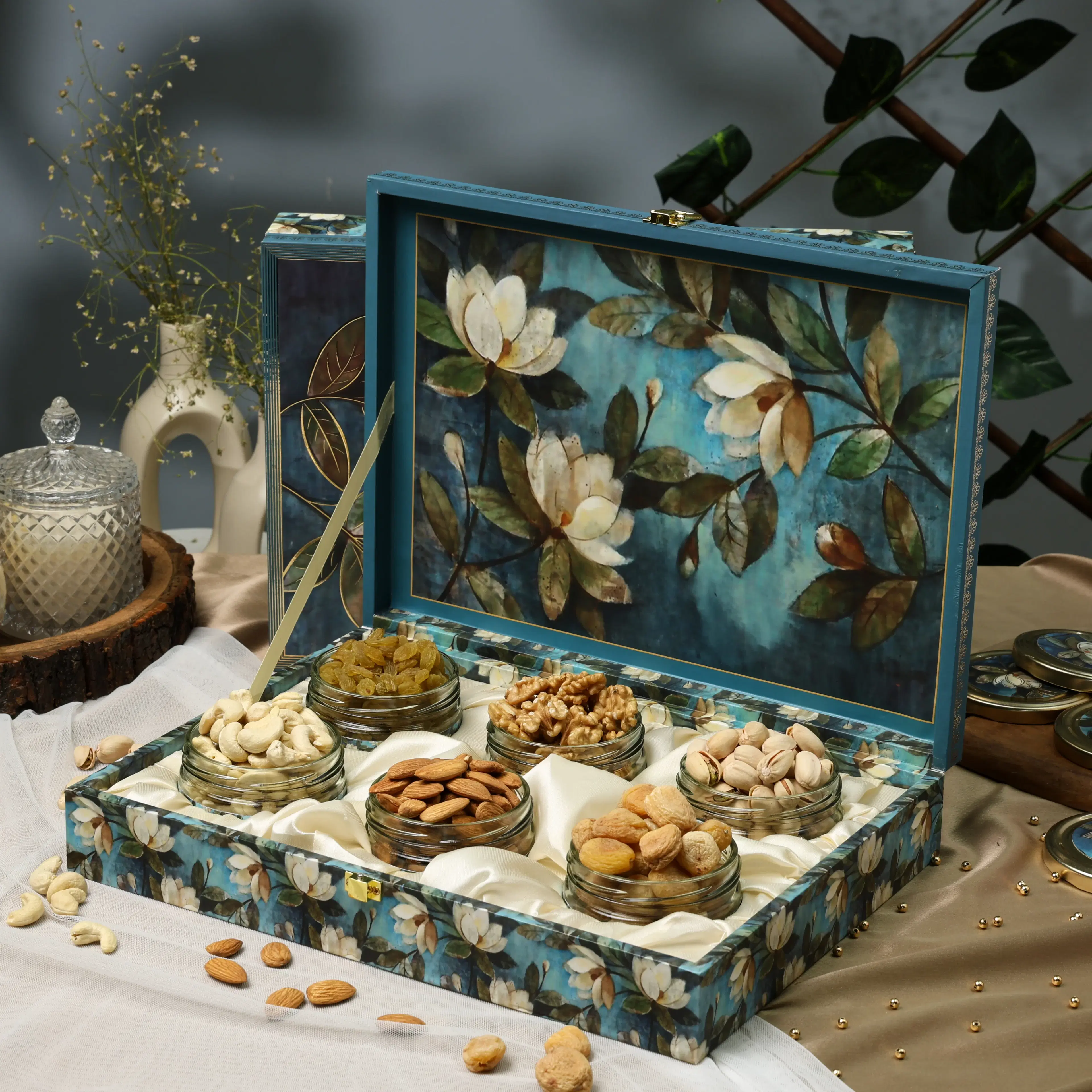 Open floral dry fruit gift box with assorted nuts
