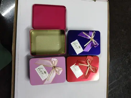 Colorful metal festival gift tin set with tags