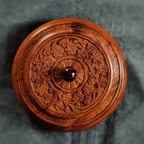 Carved round wooden dry fruit box lid design